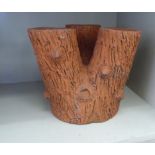 A naturalistically moulded, terracotta,