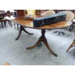 A modern Regency style mahogany finished dining table,