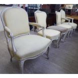 A matched modern five piece French inspired white painted and gilded,