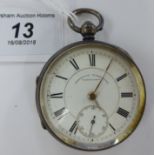 A Greenwich Timekeeper engine turned silver cased, open face pocket watch,