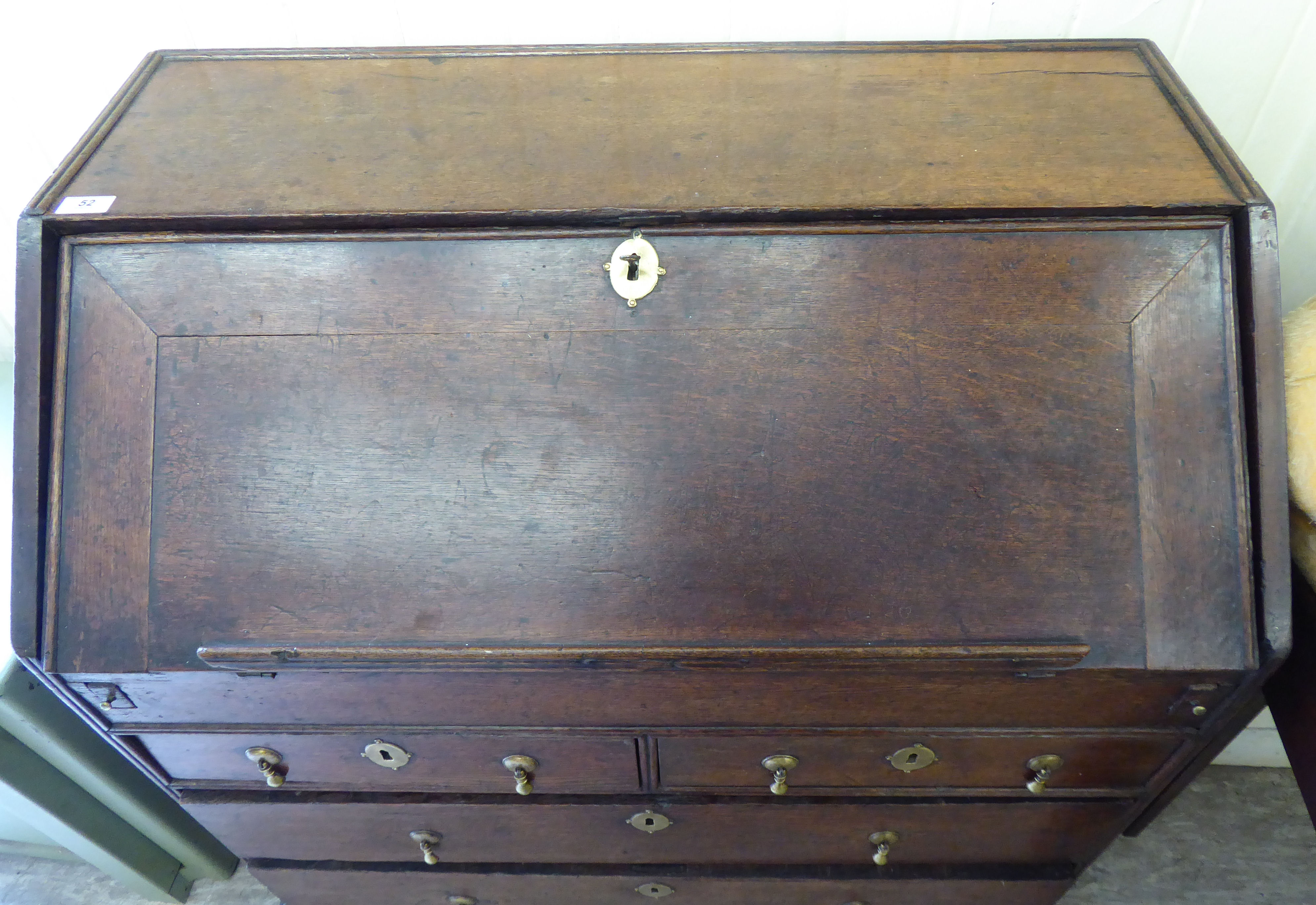 A George III oak bureau with a fall-flap, over two short/two long drawers, - Image 2 of 3