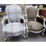 Two similar mid 20thC French inspired, white painted elbow chairs, the fabric upholstered backs,