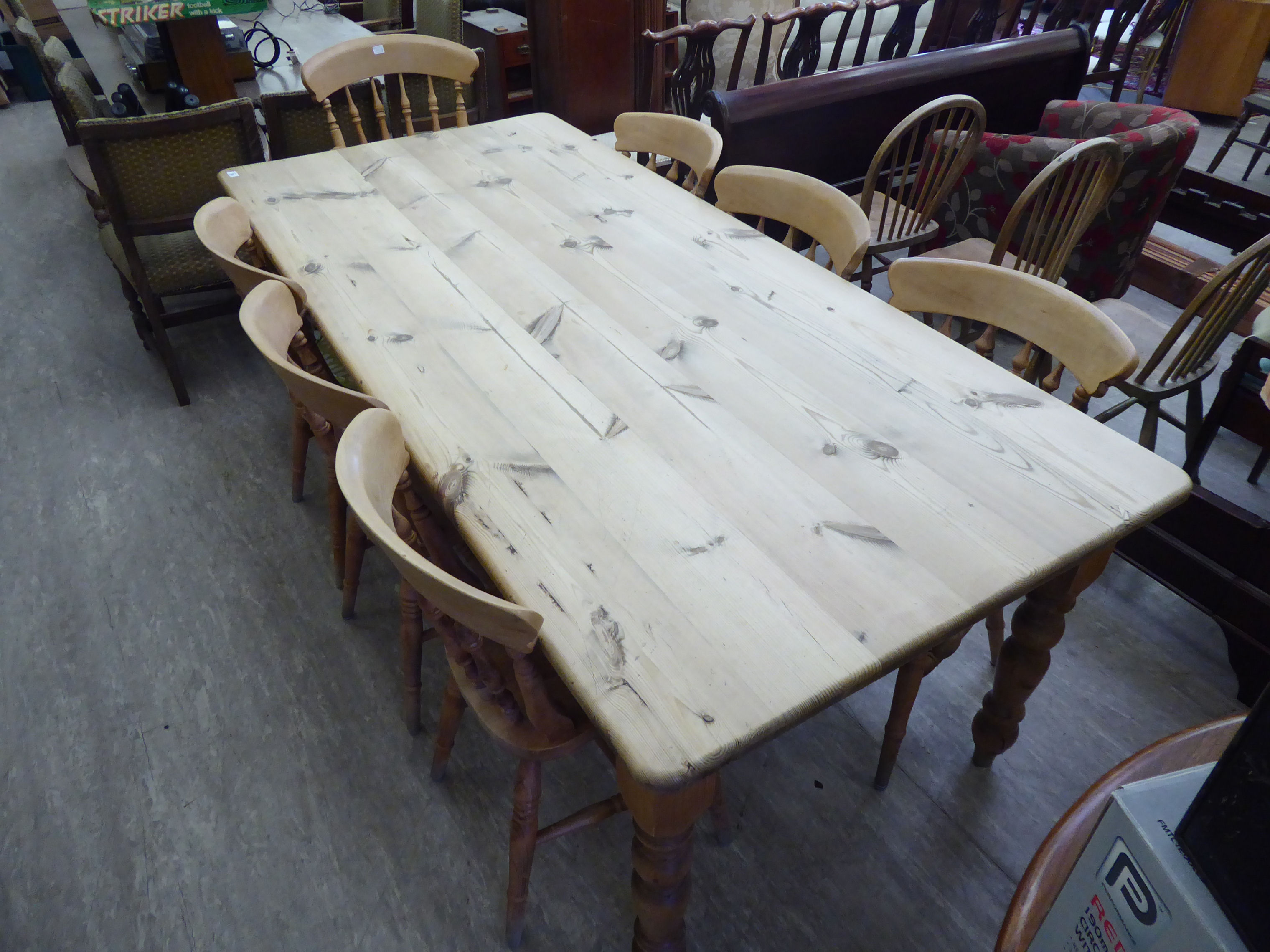 A modern honey coloured pine farmhouse kitchen table with a scrubbed, planked top, - Image 2 of 3