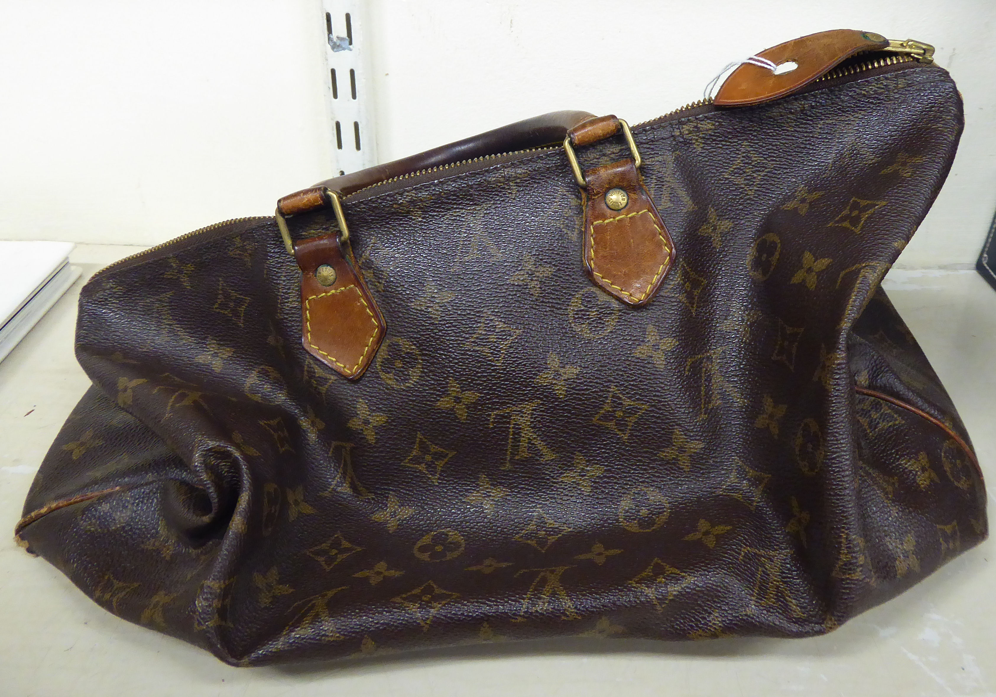 A Louis Vuitton leather holdall/handbag with a zipped opening, - Image 2 of 6