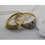 Two dissimilar 18ct gold and diamond set rings 11