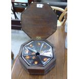 A late Victorian octagonal mahogany spittoon with inlaid border ornament,