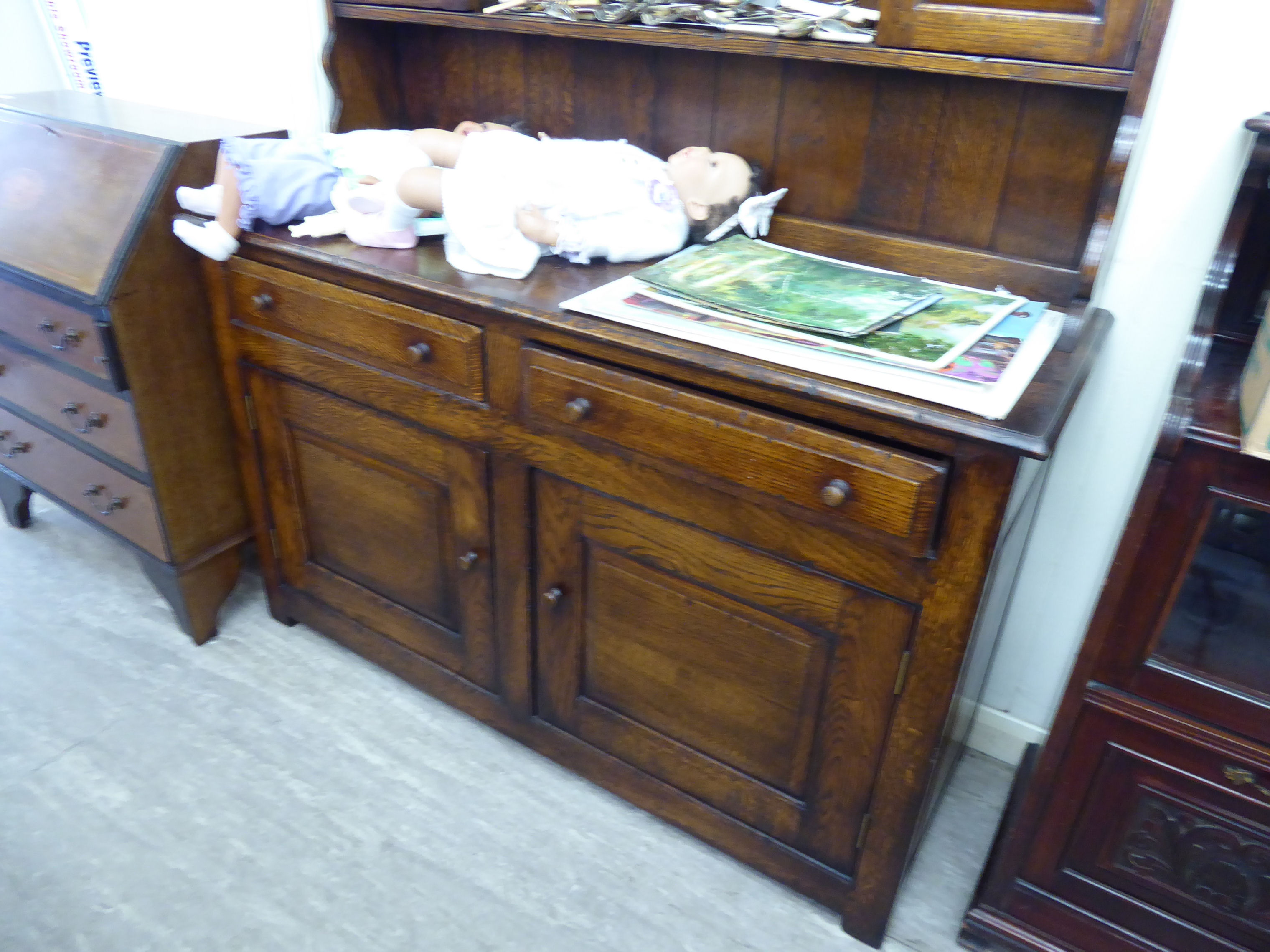 A modern reproduction of an Old English oak dresser, - Image 3 of 3