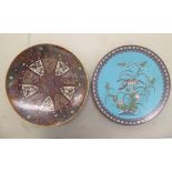Two early 20thC Japanese cloisonne dishes, one featuring heraldic devices 12''dia; the other,