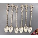 A set of six Italian white metal spoons with small bowls,