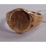 A 9ct rose gold signet ring 11