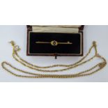 A 9ct gold bar brooch, set with two sapphires, a 9ct gold rope link neckchain,