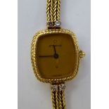 A lady's Eterna 18ct gold rope effect and diamond set wristwatch, faced by a plain dial,