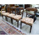 A set of four William IV foliate carved, mahogany framed dining chairs with curved bar backs,