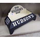 A cast iron dog's bowl with advertising logos for 'Hudson's Soap' 15''w OS2