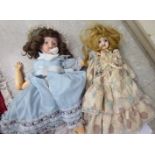 Two similar 1950s American china dolls with painted features,