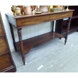 A mid Victorian mahogany washstand, raised on ring turned legs, united by a platform undershelf 30.