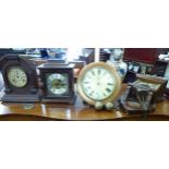 Four clocks: to include a late Victorian mahogany cased wall clock;