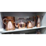 Functional metalware: to include a pair of snakeskin effect copper jugs of tapered conical form
