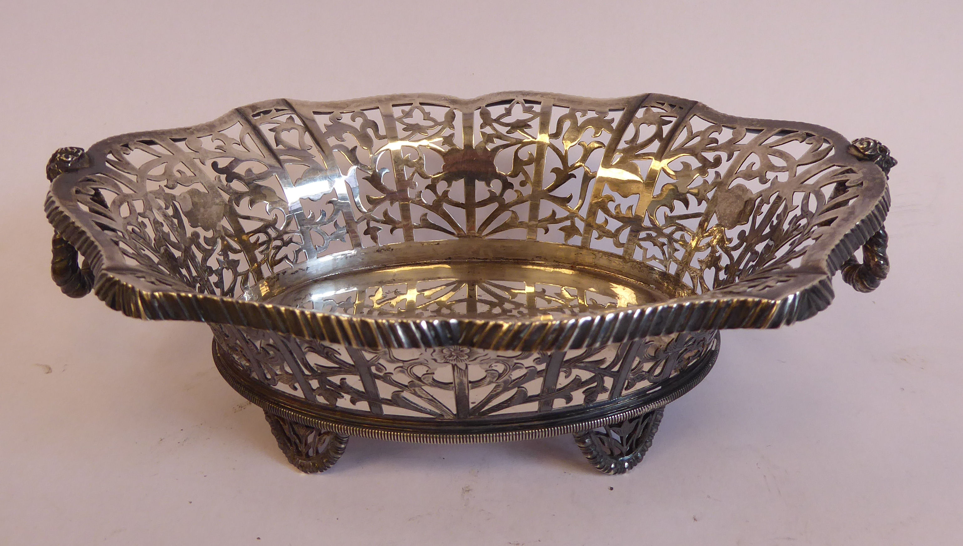 A late 19th/early 20thC Thai silver coloured metal oval basket with decoratively pierced, engraved, - Image 4 of 7