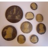 Nine Grand Tour carved slate cameo tablets,