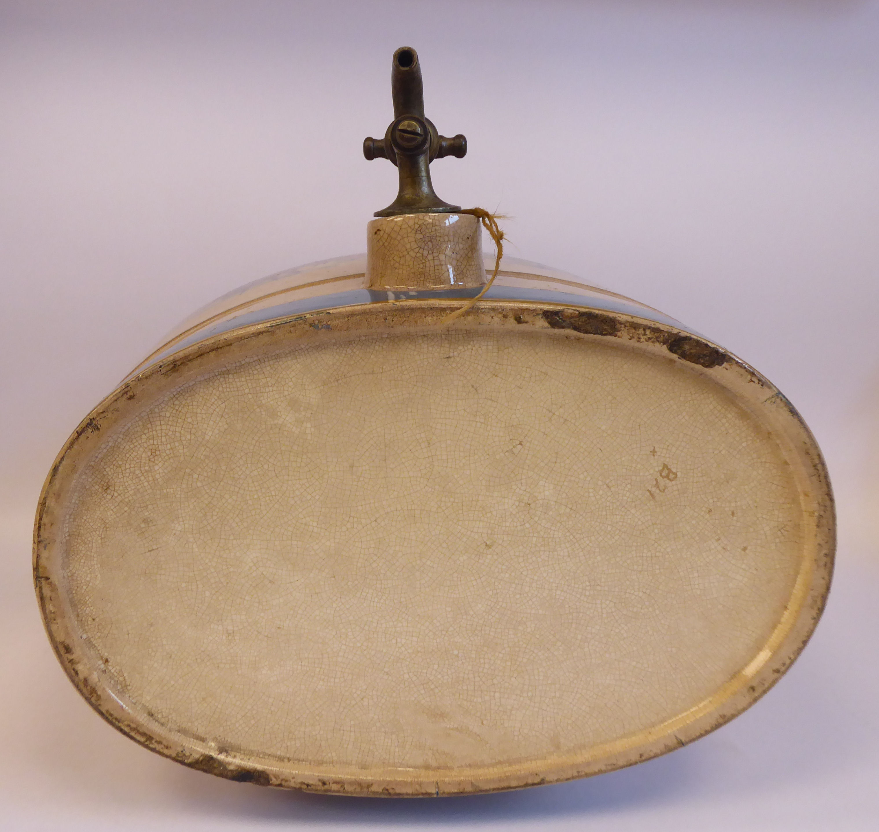 A late 19thC cream coloured pottery, oval barrel design bar room dispenser, - Image 6 of 7