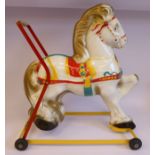 A Sebel Products push-along-toy 'Mobo' pony,