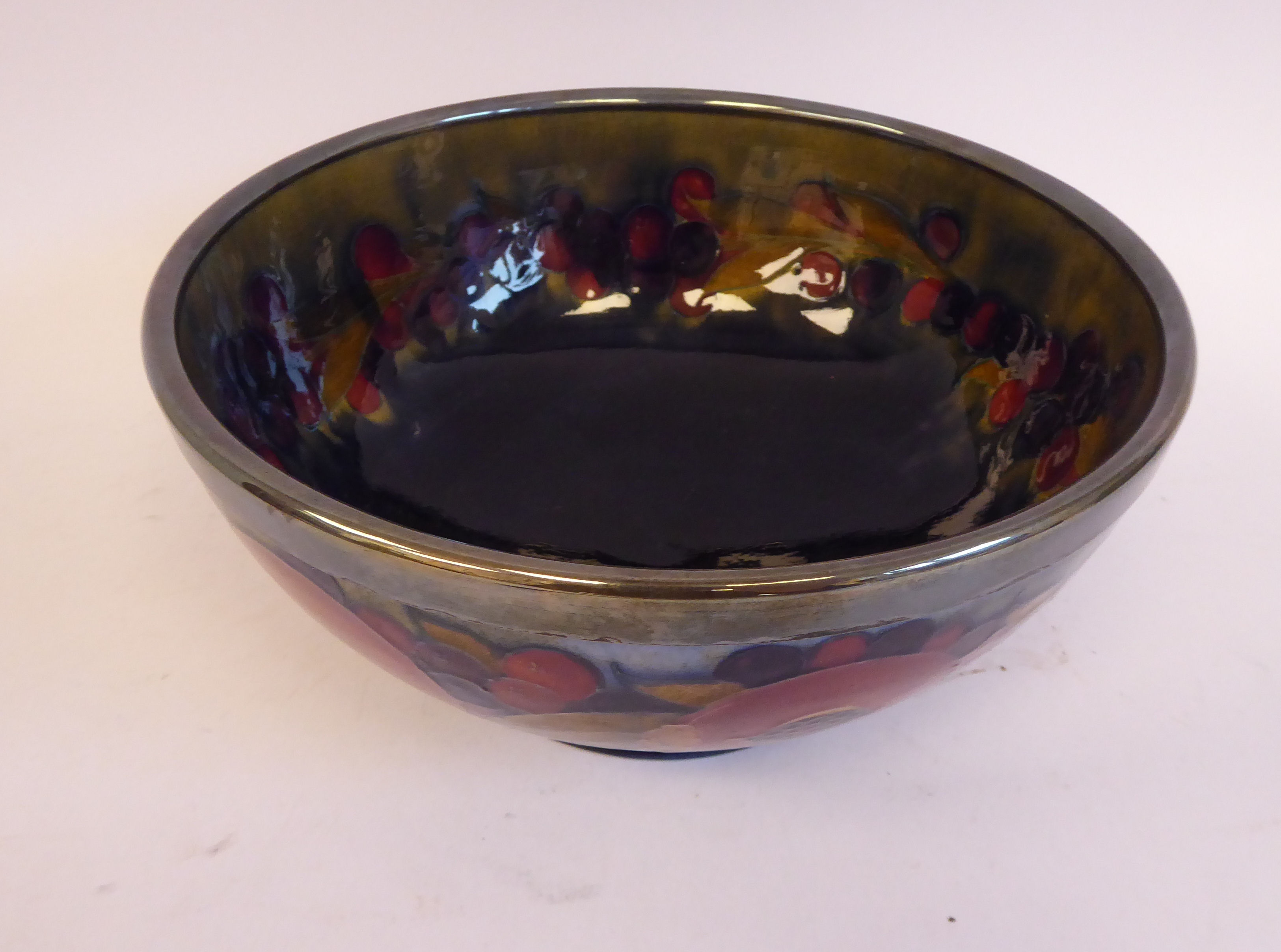 A Moorcroft pottery footed fruit bowl, decorated in a version of the Pomegranate design, - Image 4 of 7