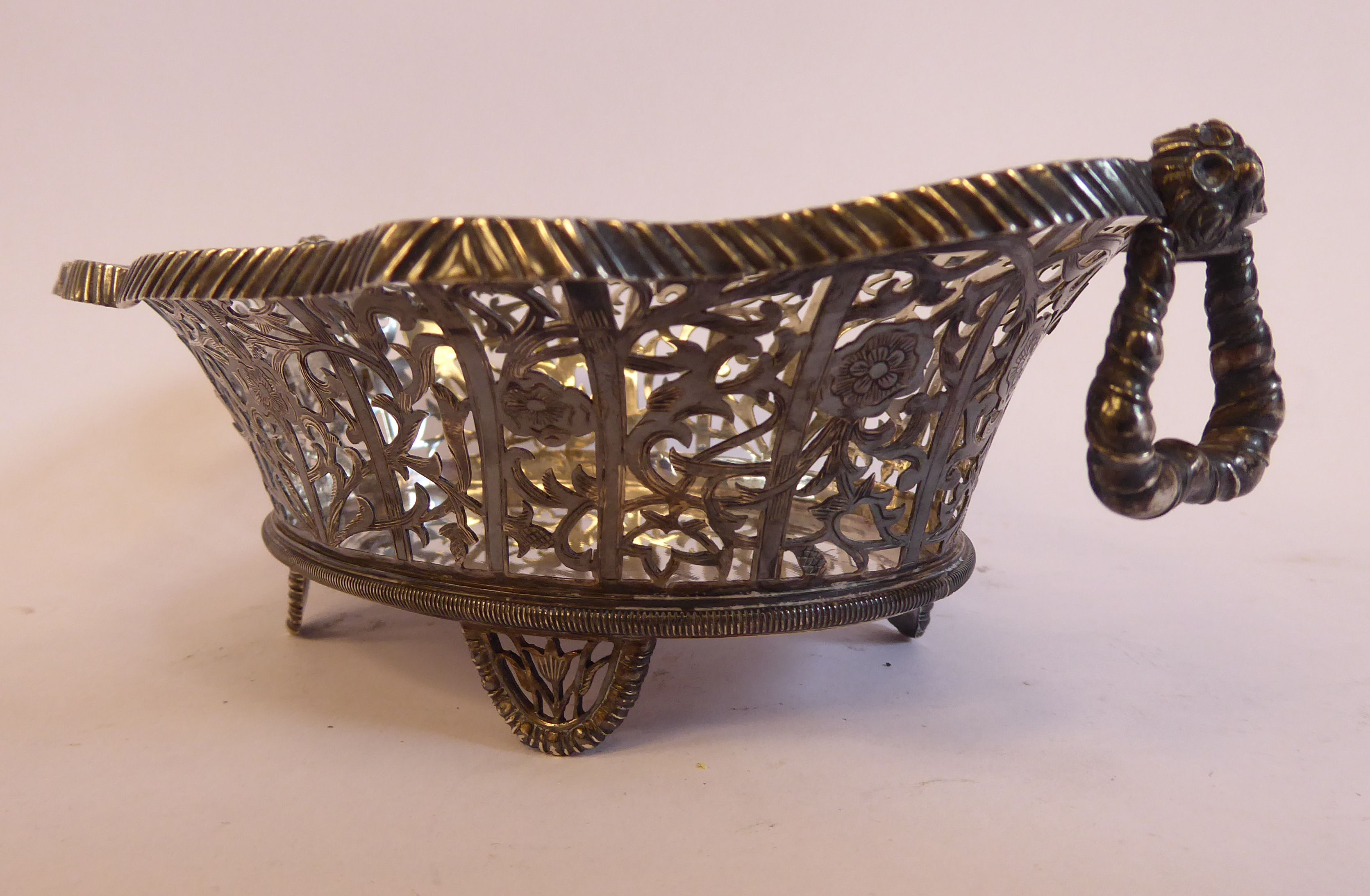 A late 19th/early 20thC Thai silver coloured metal oval basket with decoratively pierced, engraved, - Image 2 of 7