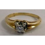 WITHDRAWN A gold coloured metal claw set diamond and solitaire ring