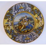 A 19thC Urbino majolica istoriato charger, the central pictorial figure study surrounded by cherubs,
