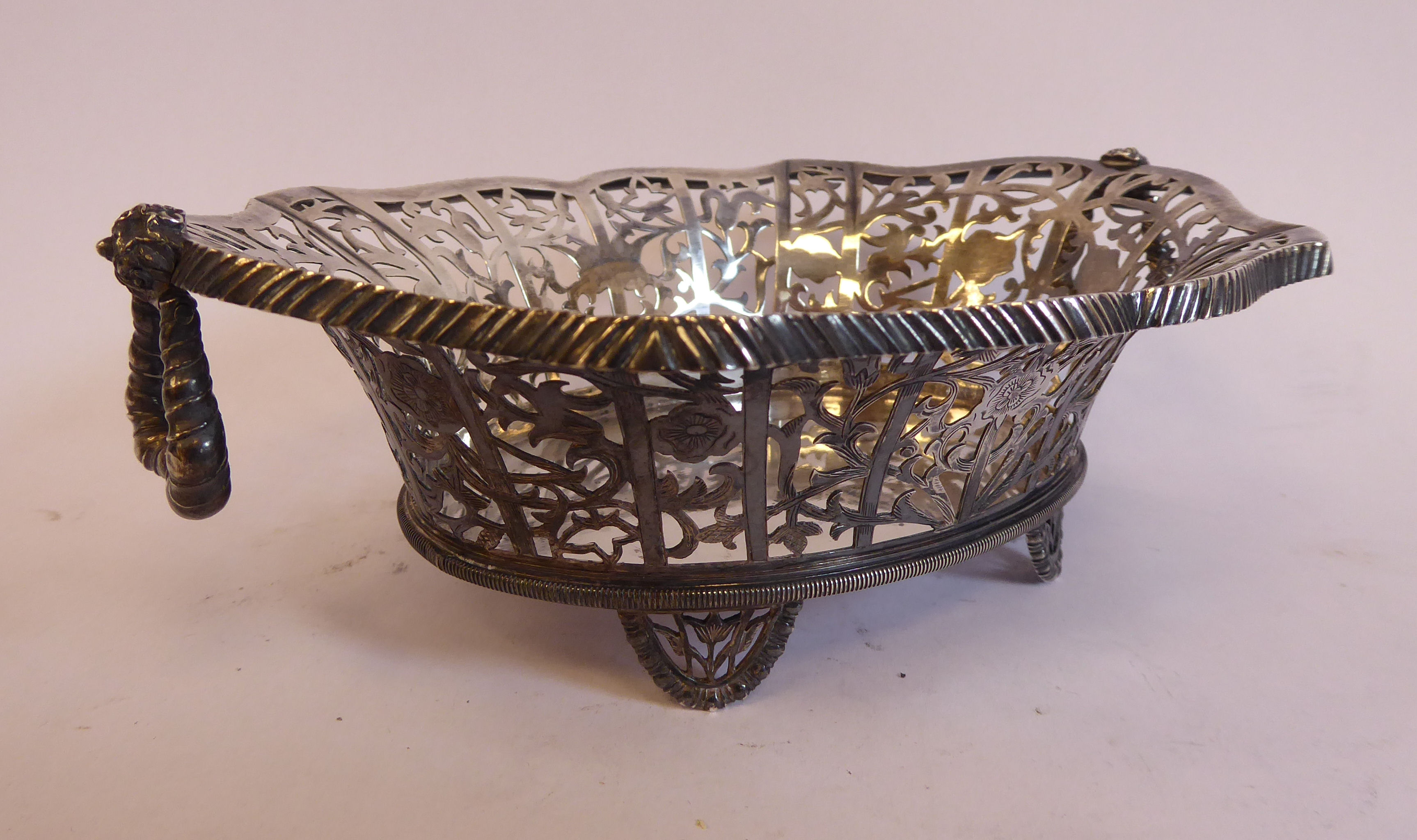 A late 19th/early 20thC Thai silver coloured metal oval basket with decoratively pierced, engraved, - Image 3 of 7