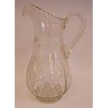 A late 19th/early 20thC crystal cordial jug of waisted baluster form with a drawn loop handle,
