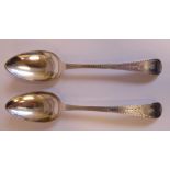 A pair of George III silver Old English pattern tablespoons with bright-cut engraved ornament