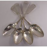 A set of four early Victorian silver fiddle pattern dessert spoons James Beebe London 1840