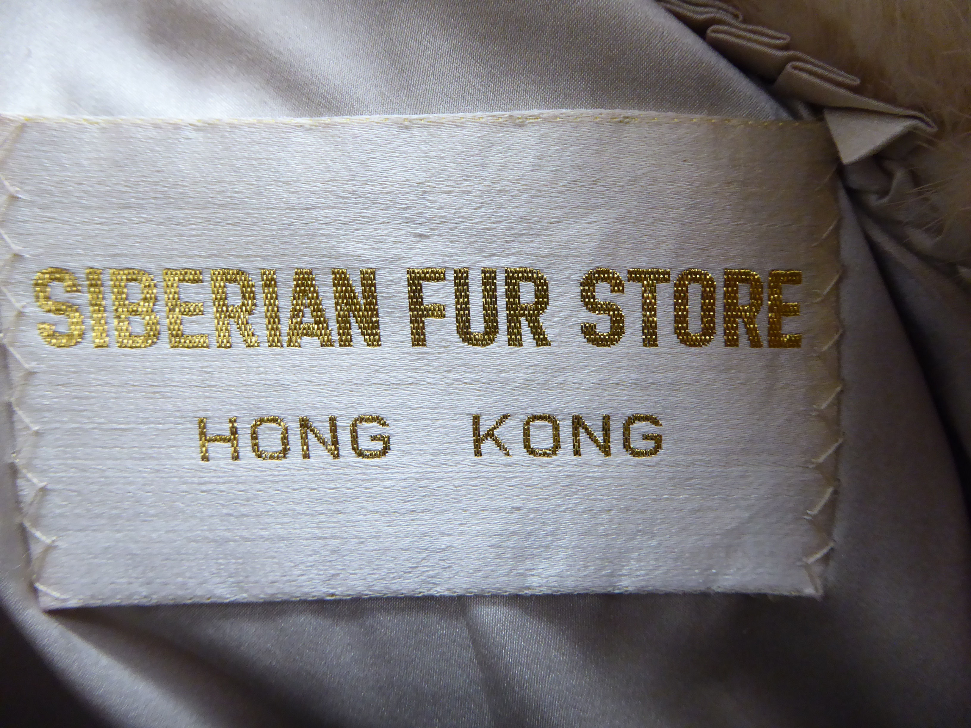 A pale blonde mink coat with a lapelled collar and satin lining bears the label of Siberian Fur - Image 4 of 6