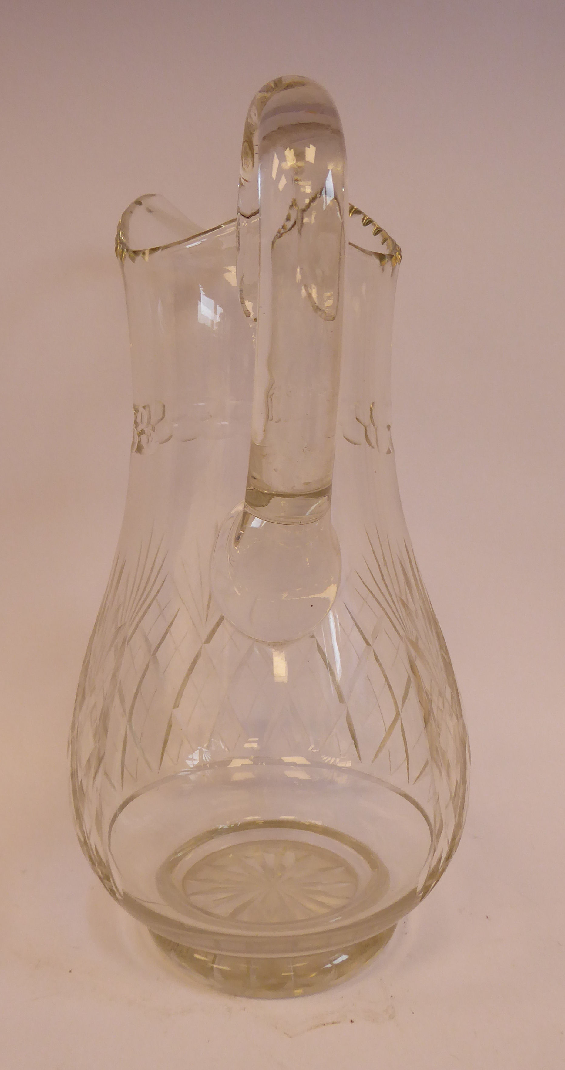 A late 19th/early 20thC crystal cordial jug of waisted baluster form with a drawn loop handle, - Image 5 of 6