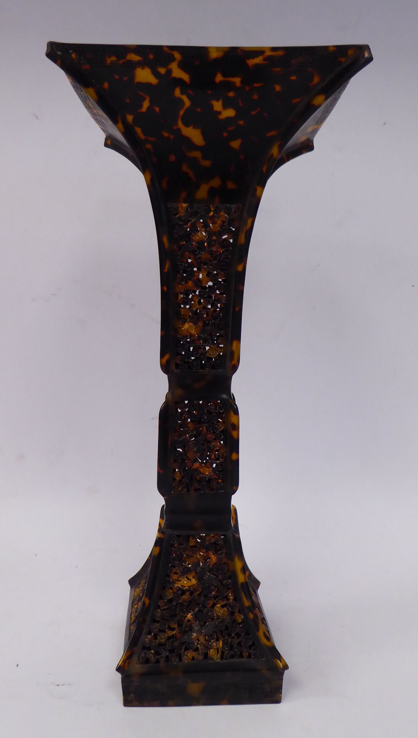 A Chinese tortoiseshell vase of waisted, square form,