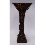A Chinese tortoiseshell vase of waisted, square form,
