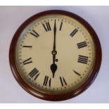 A late Victorian mahogany cased wall timepiece with a turned surround,