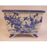 A 20thC Japanese porcelain rectangular planter, on stubby feet,