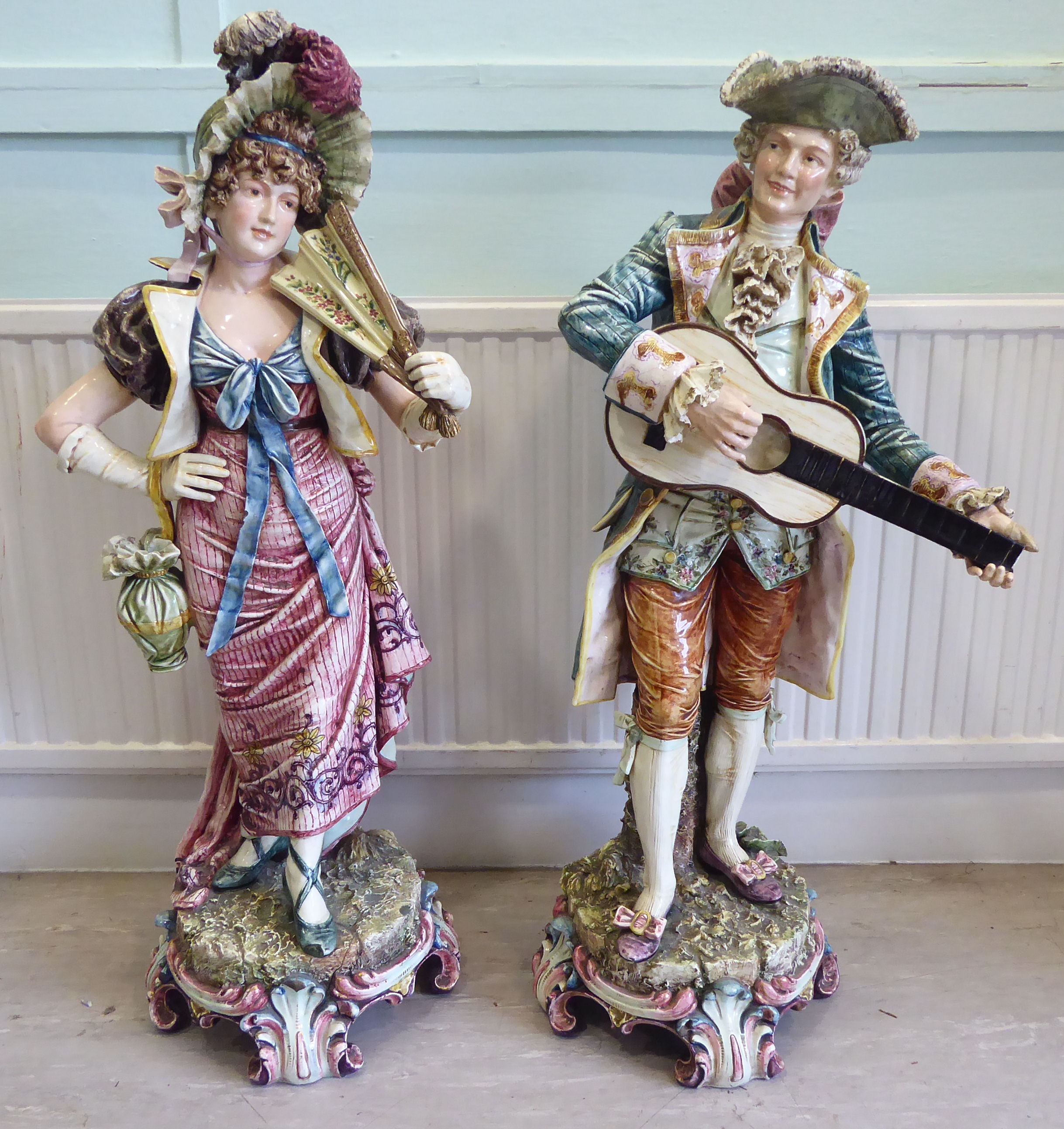 A pair of late 19thC Austrian porcelain standing figures,