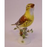 A 20thC Meissen porcelain model, a bird with yellow and brown plumage,