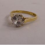 WITHDRAWN An 18ct gold claw set diamond solitaire ring