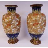 A pair of Royal Doulton blue, green and brown glazed stoneware, ovoid shaped vases,