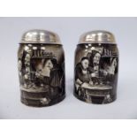 A pair of Lenox porcelain tankards of tapered form, decorated in monochrome,