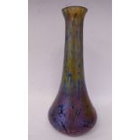 A 20thC iridescent glass vase of squat, bulbous form with a long,