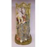 An Angelo Minghetti majolica figure,