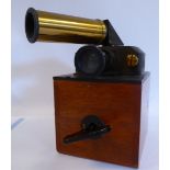 An early 20thC Alexander Wright & Co Simmance Patent Flicker Photometer, model 928H with a rotating,