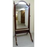 An Edwardian satinwood and ebony string inlaid mahogany framed cheval mirror,