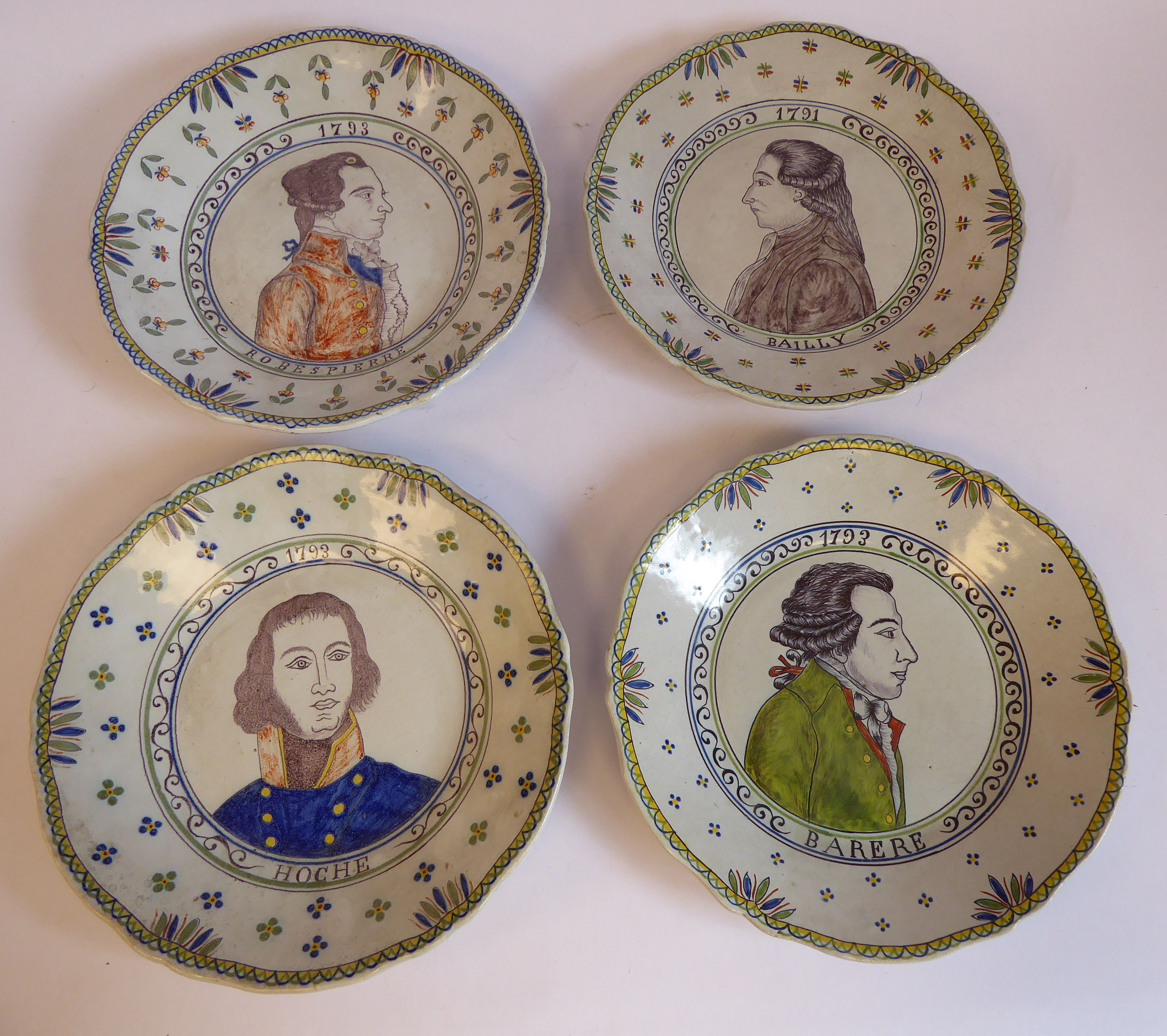 A set of four early 20thC French faience dishes,